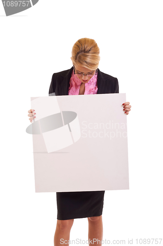 Image of business woman holding white board 