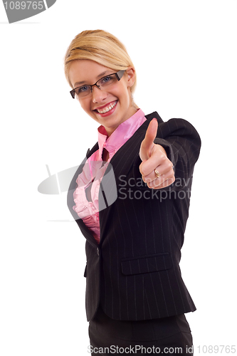 Image of Business woman giving thumbs up sign