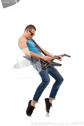 Image of tip toe guitar player