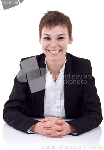 Image of business woman behind the desk