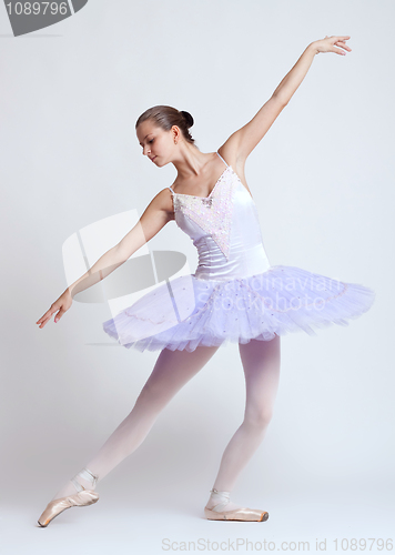 Image of ballerina in purple tutu 