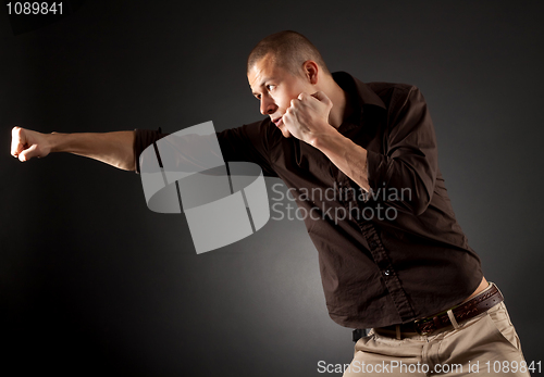 Image of a man in fight action