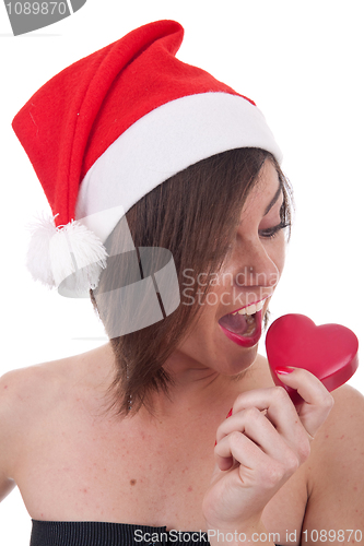 Image of  Santa eating a candy 