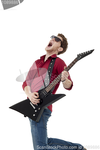 Image of Guitarist screaming and jumping