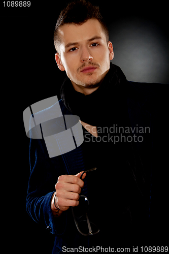 Image of man wearing elegant blue suit 