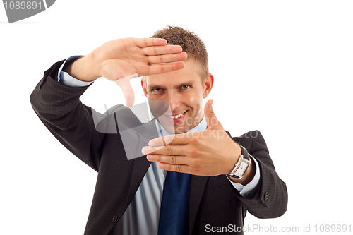 Image of business man making a hand frame