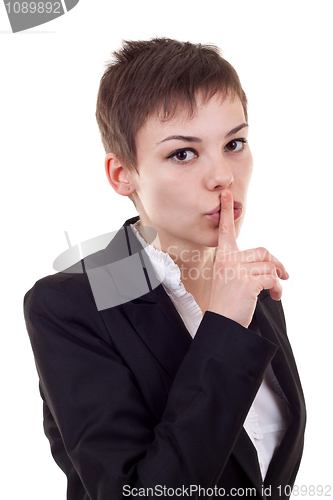 Image of woman with the finger near her lips