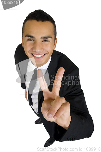 Image of happy successful gesturing businessman