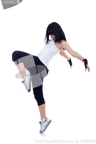 Image of dancer posing on studio background 