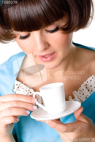 Image of woman enjoying a cup of coffee 