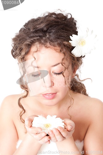 Image of young pretty woman with flower 