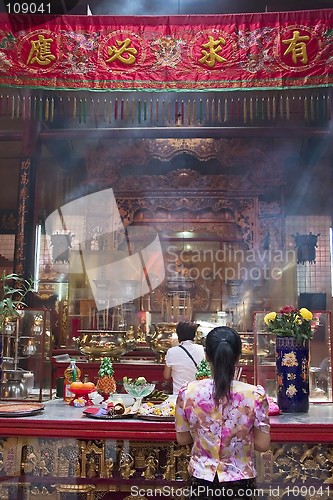 Image of Asian Woman Praying