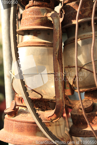 Image of rust and brocken kerosene lamp 