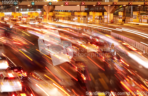 Image of traffic downtown at night