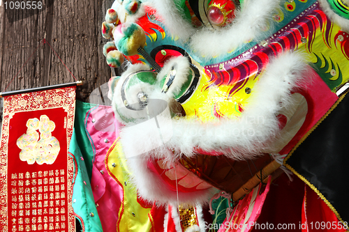 Image of Close up of a red chinese lion head 