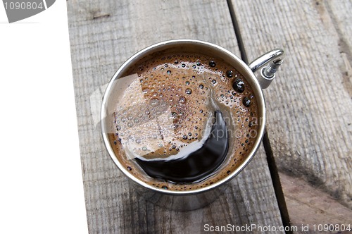 Image of Metal mug of coffee