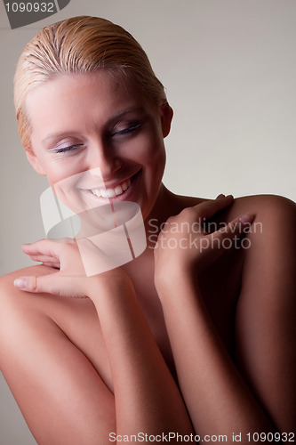 Image of nude blond girl smile