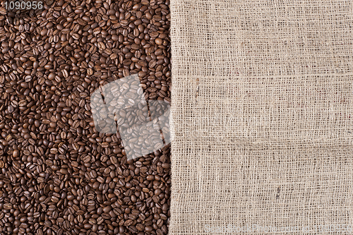 Image of Coffee background with beans and a canvas 