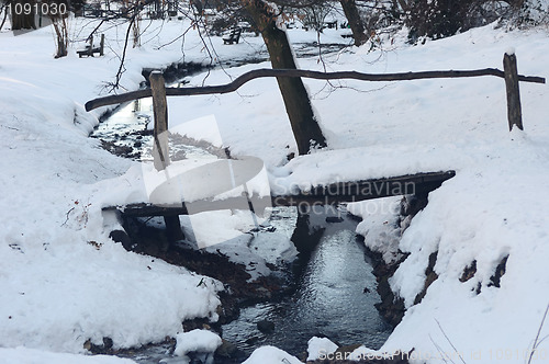 Image of Wooden bridge and brook