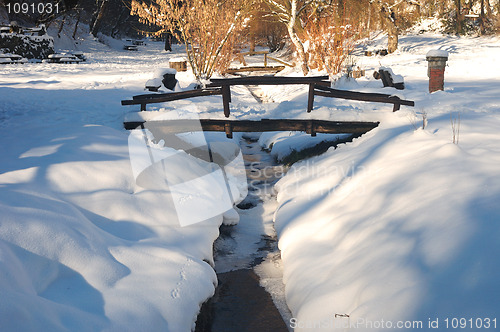 Image of Wooden bridge and brook