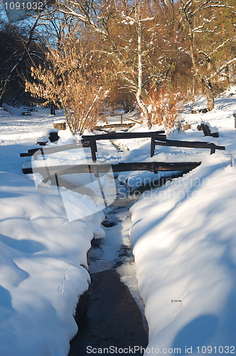 Image of Wooden bridge and brook