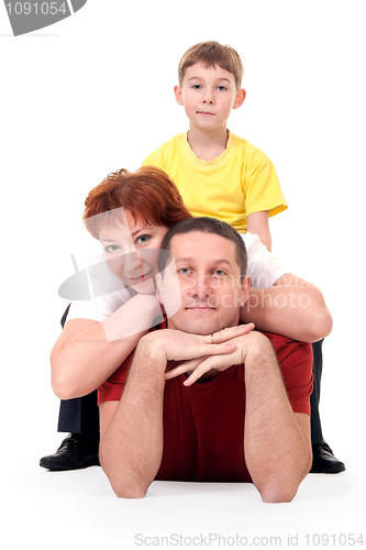 Image of family of three on the floor