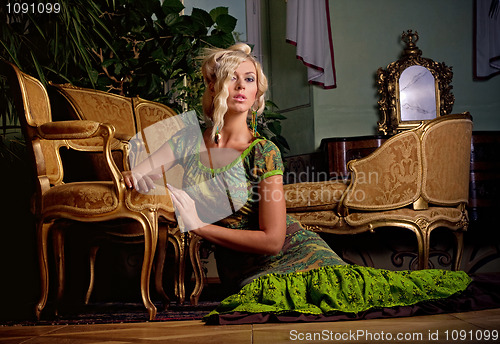 Image of attractive blond girl in gown at the castle