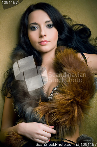 Image of attractive glamor girl with brown boa