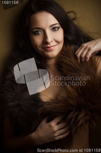 Image of attractive glamor girl with brown boa