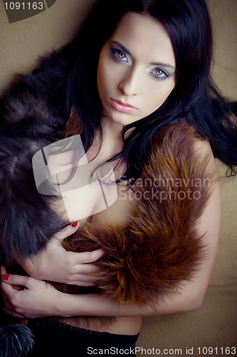 Image of lust attractive glamor girl with boa