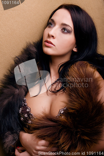 Image of lust attractive glamor girl with boa