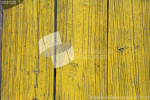 Image of Yellow painted wooden planks