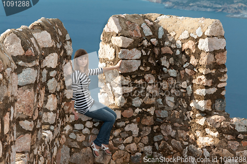 Image of girl on the wall