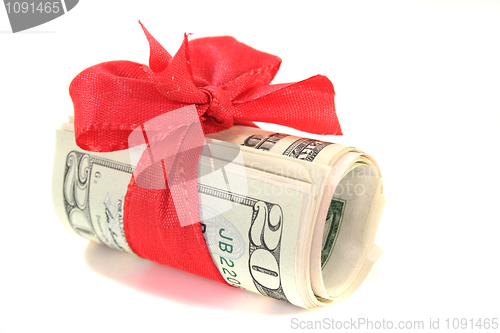 Image of dollar bills with a bow