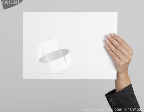 Image of Holding a paper card