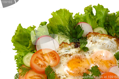 Image of Chicken eggs with greens isolated