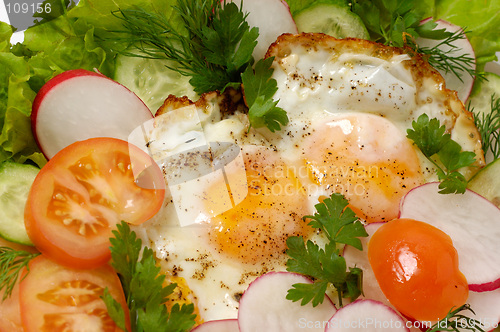 Image of Chicken eggs with greens macro isolated