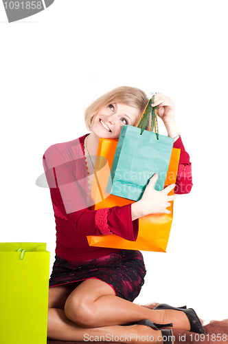 Image of Beautiful woman with shopping bags