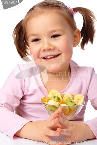 Image of Little girl with fruit salad