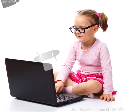 Image of Little girl with laptop