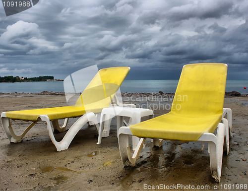 Image of Yellow chairs on beach