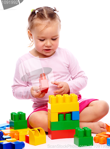 Image of Little girl with building bricks