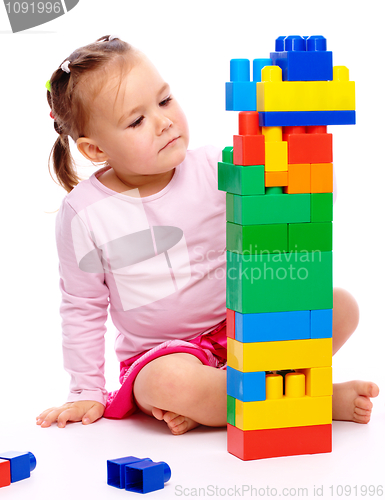 Image of Little girl with building bricks