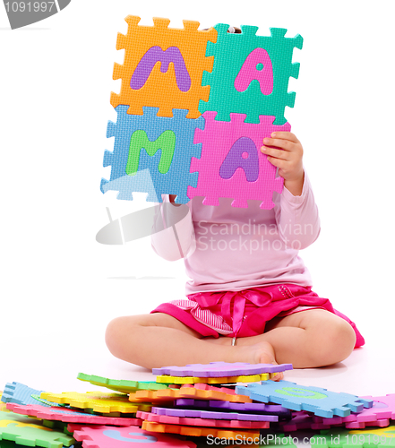 Image of Little girl with alphabet