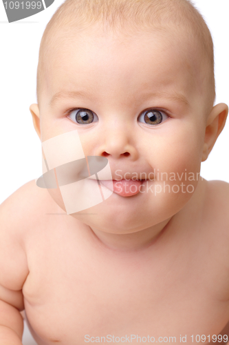 Image of Happy toddler smiling, sticking his tongue out