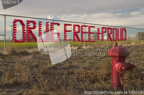 Image of drug free and proud - school chain fence