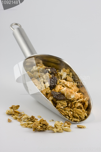 Image of scoop of "supernutty" organic granola