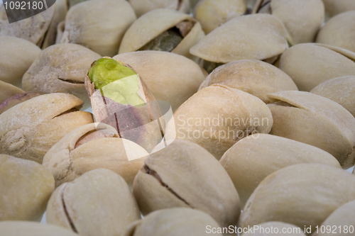 Image of pistachios nuts with a selective focus and spot light