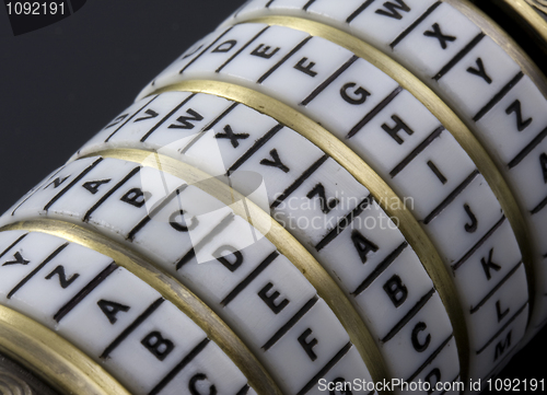 Image of Password or keyword - combination puzzle box with rings of letters