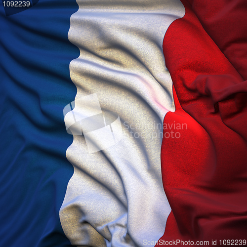 Image of Flag of France, fluttering in the breeze, backlit rising sun